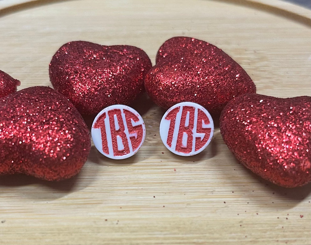 These cute Monogrammed Studs are cute a simple. Dress them up or down have it you way! The monogram logo comes in all the basic colors!
